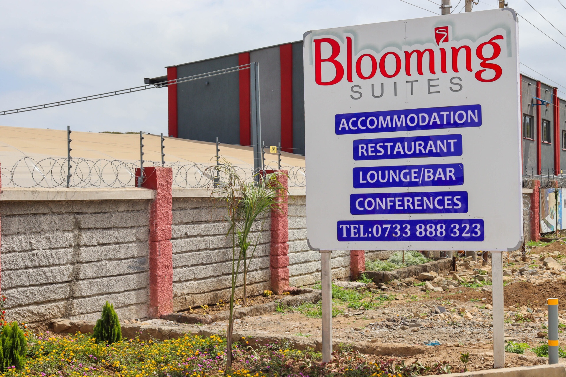 Blooming Suites entrance sign