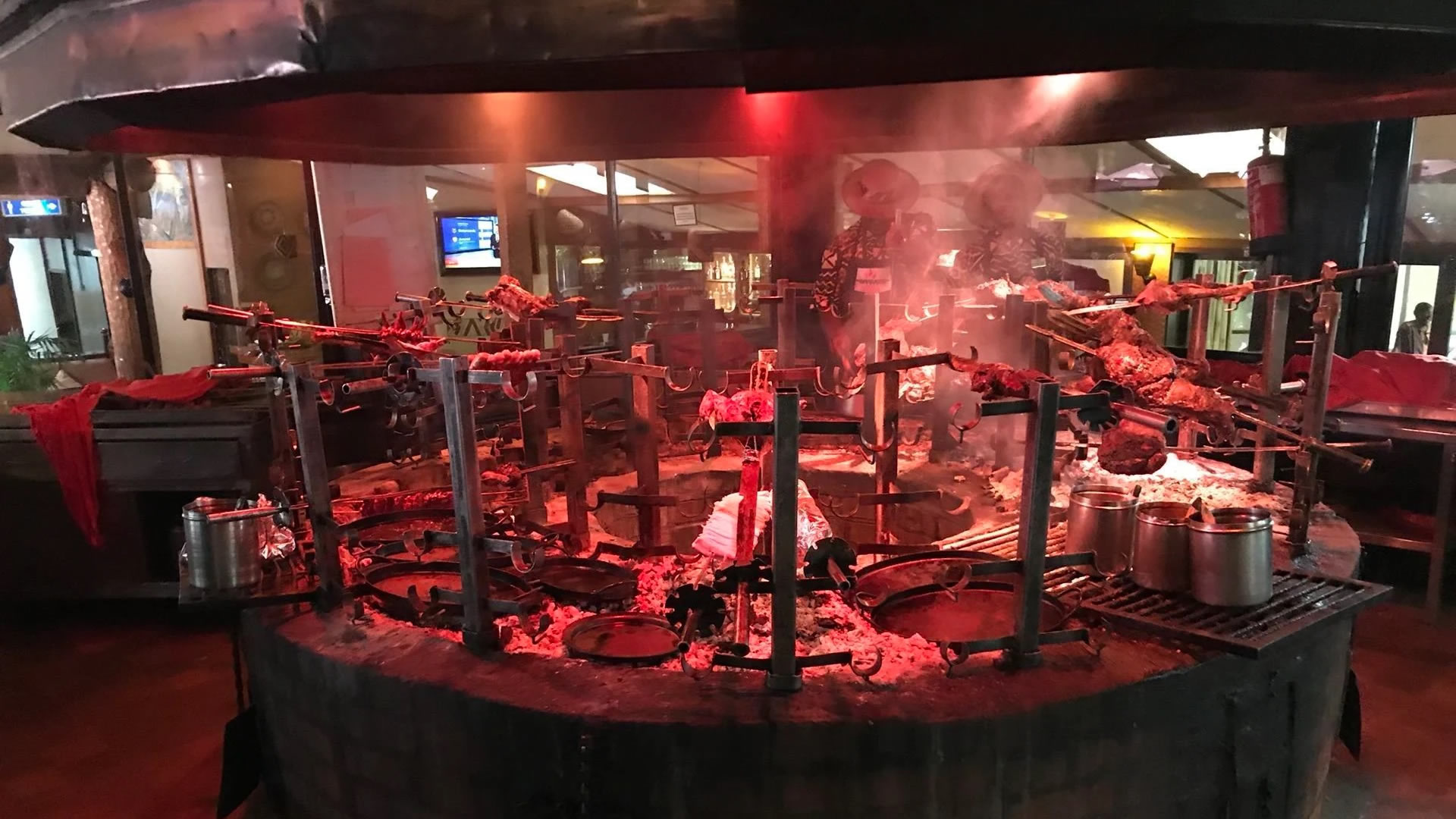The famous open charcoal pit at Carnivore Restaurant, Nairobi