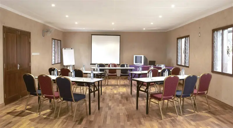 Conference room set up for a meeting at Ashnil Aruba Lodge
